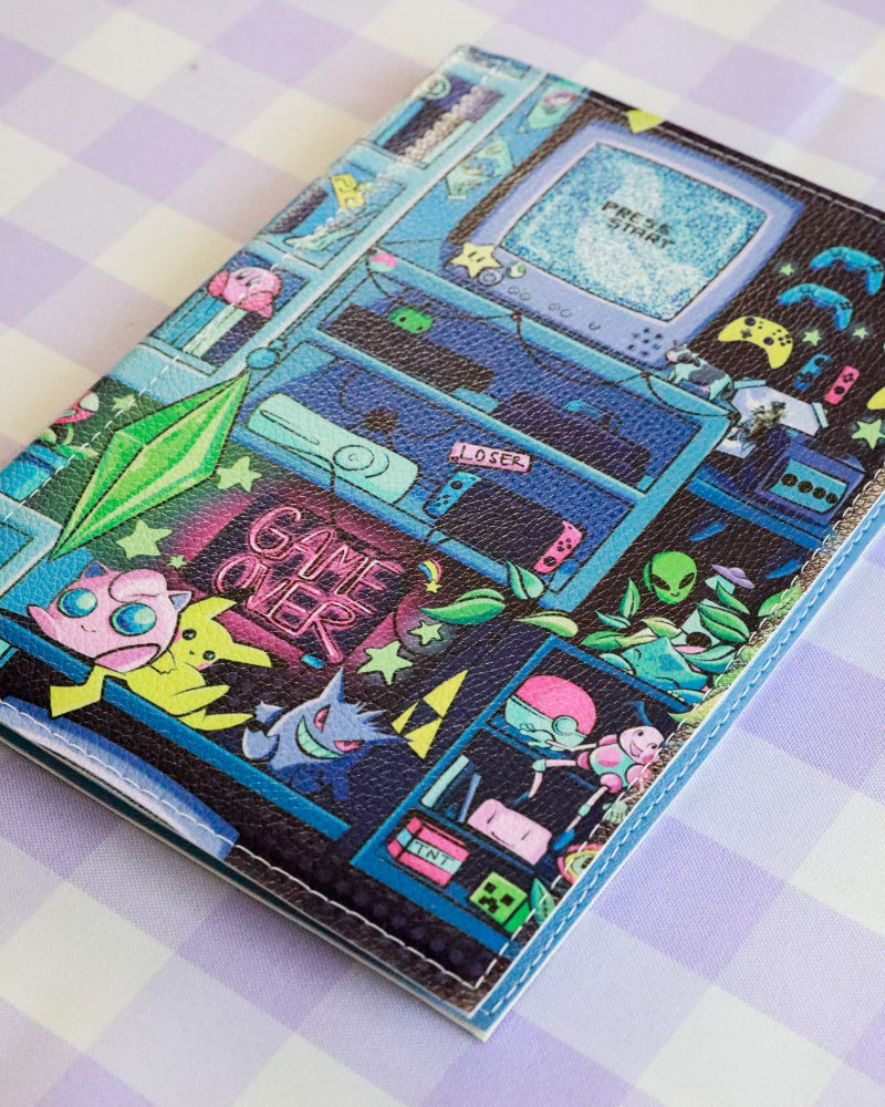 Colorful retro-themed notebook on a checkered surface