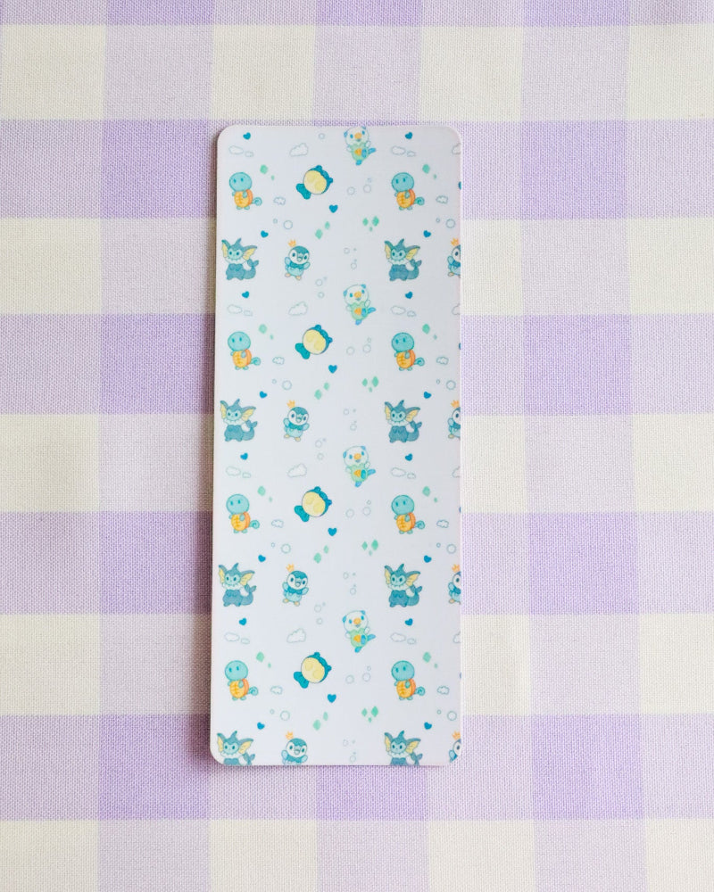 Sheet with cartoon designs on a purple and yellow checkered background