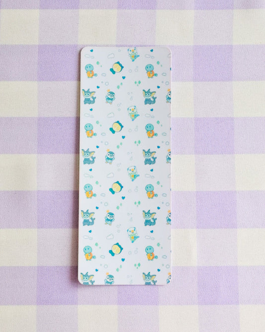 Sheet with cartoon designs on a purple and yellow checkered background