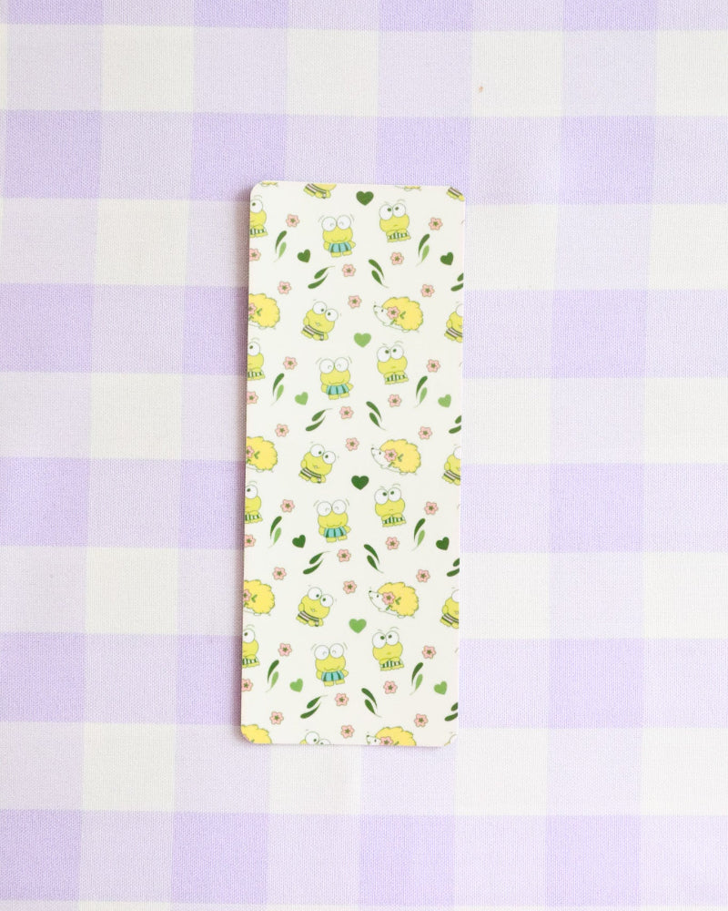 Floral-patterned fabric swatch on a purple and white checkered background