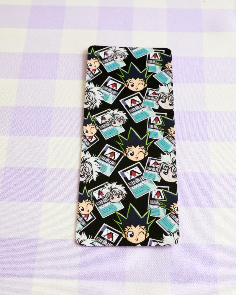 Phone case with cartoon character design on a checkered background