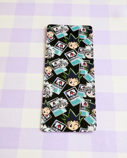 Phone case with cartoon character design on a checkered background