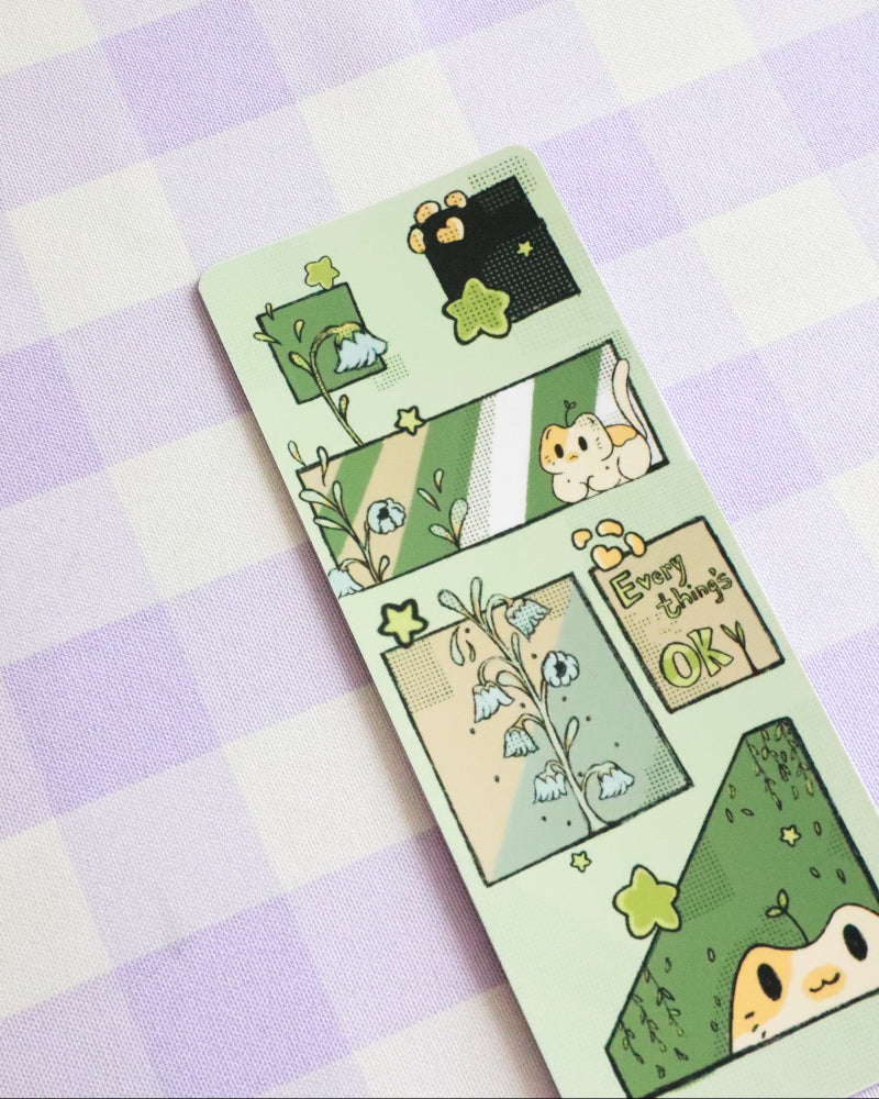 Sticker sheet with cute green characters on a purple and white checkered background