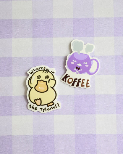 Sticker of a cartoon duck with text on a purple and white checkered background