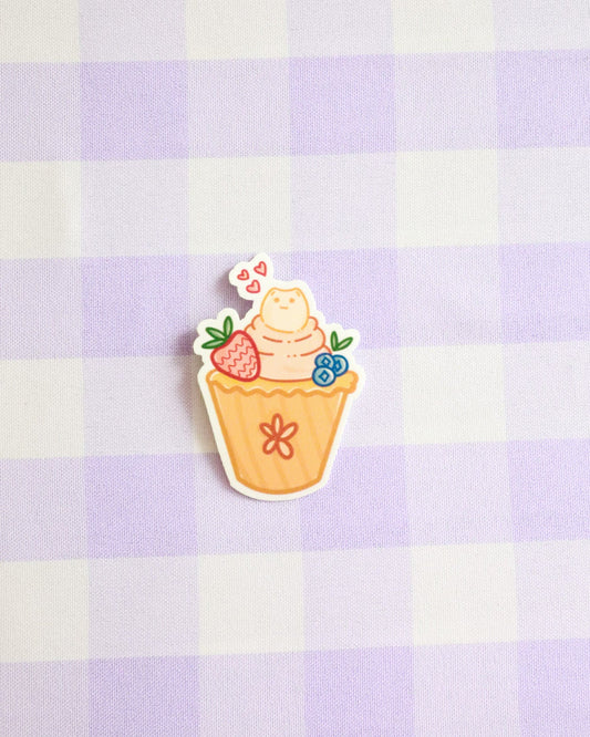 Sticker of a ice cream cone with flowers on a purple checkered background