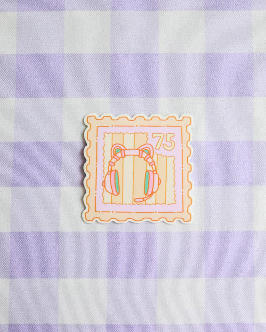 Decorative stamp with cartoon character on a purple and white checkered background