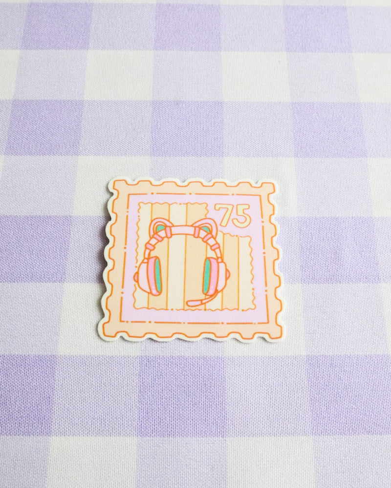 Decorative stamp with cartoon characters on a purple and white checkered background