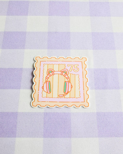 Decorative stamp with cartoon characters on a purple and white checkered background