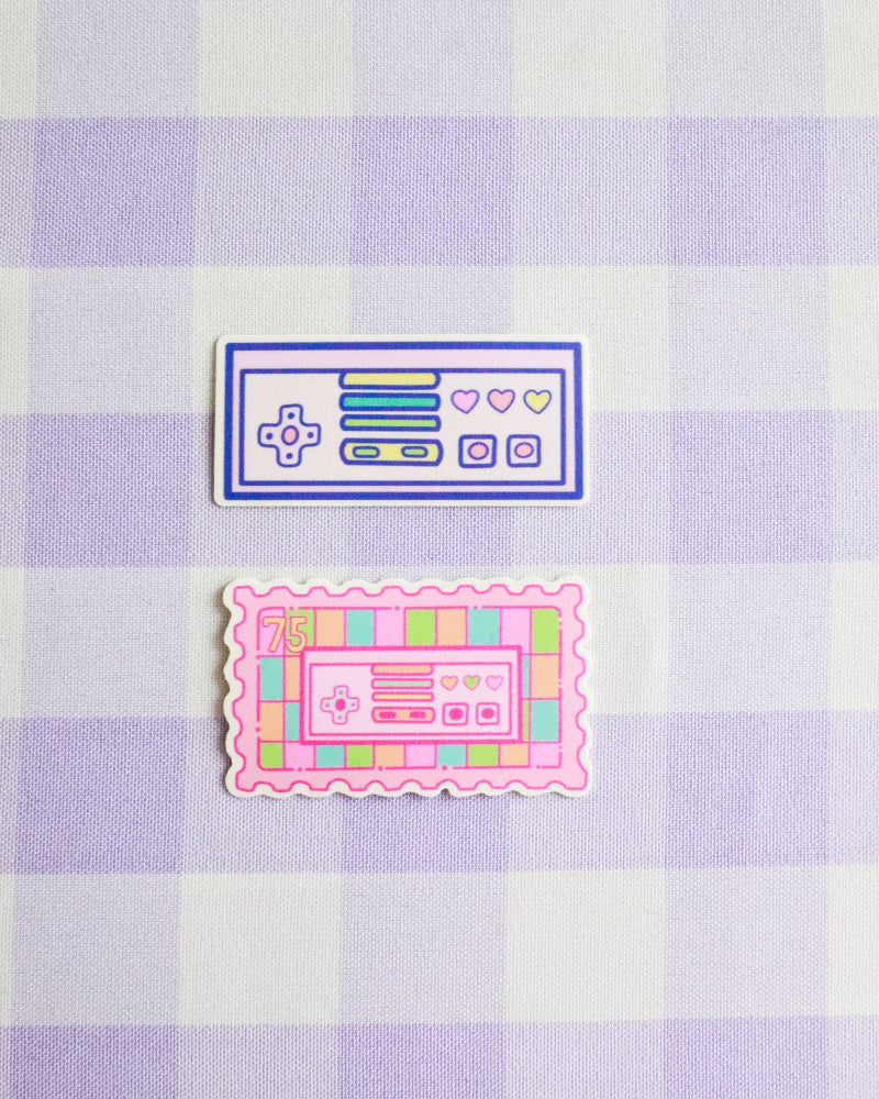 Two retro-style stickers on a purple and white checkered background