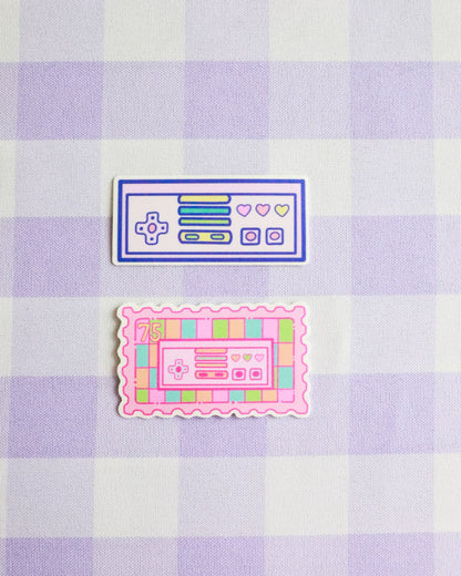 Two retro-style stickers on a purple and white checkered background