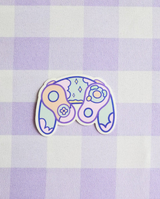 Colorful sticker on a purple and white checkered background