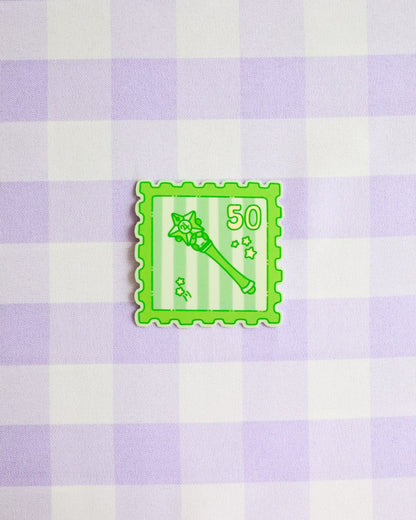 Green stamp icon with number 50 on a purple and white checkered background