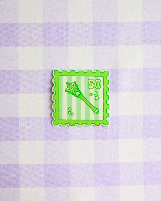 Green stamp icon with number 50 on a purple and white checkered background