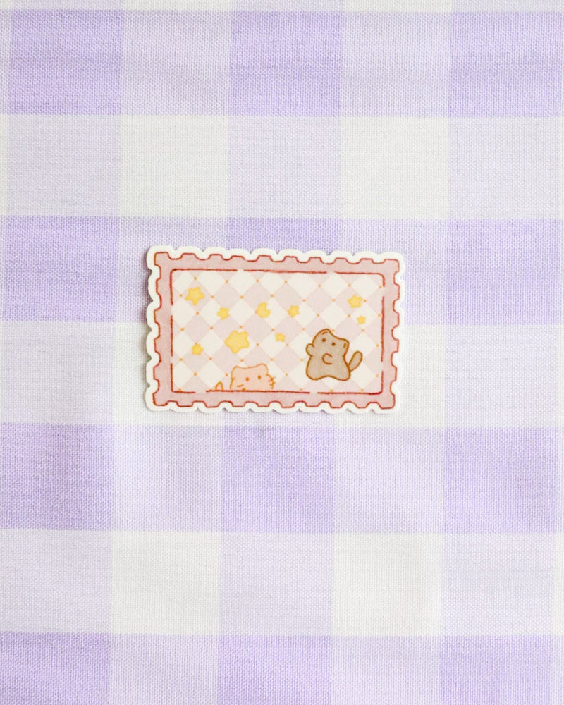 Checkered fabric with a small cartoon design in the center