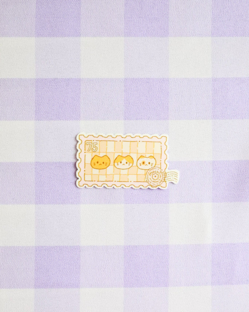Checkered pattern with a cartoon character sticker in the center