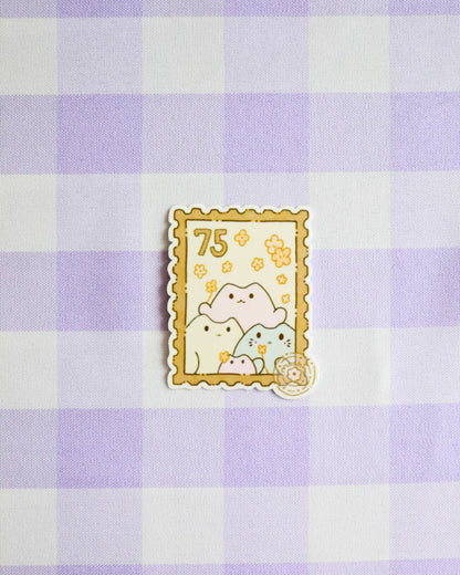 Decorative sticker with cartoon characters on a purple and white checkered background