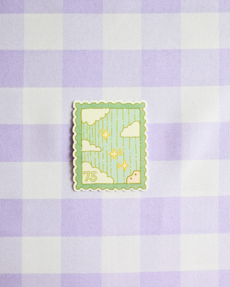 Decorative sticker with a cartoon design on a purple and white checkered background