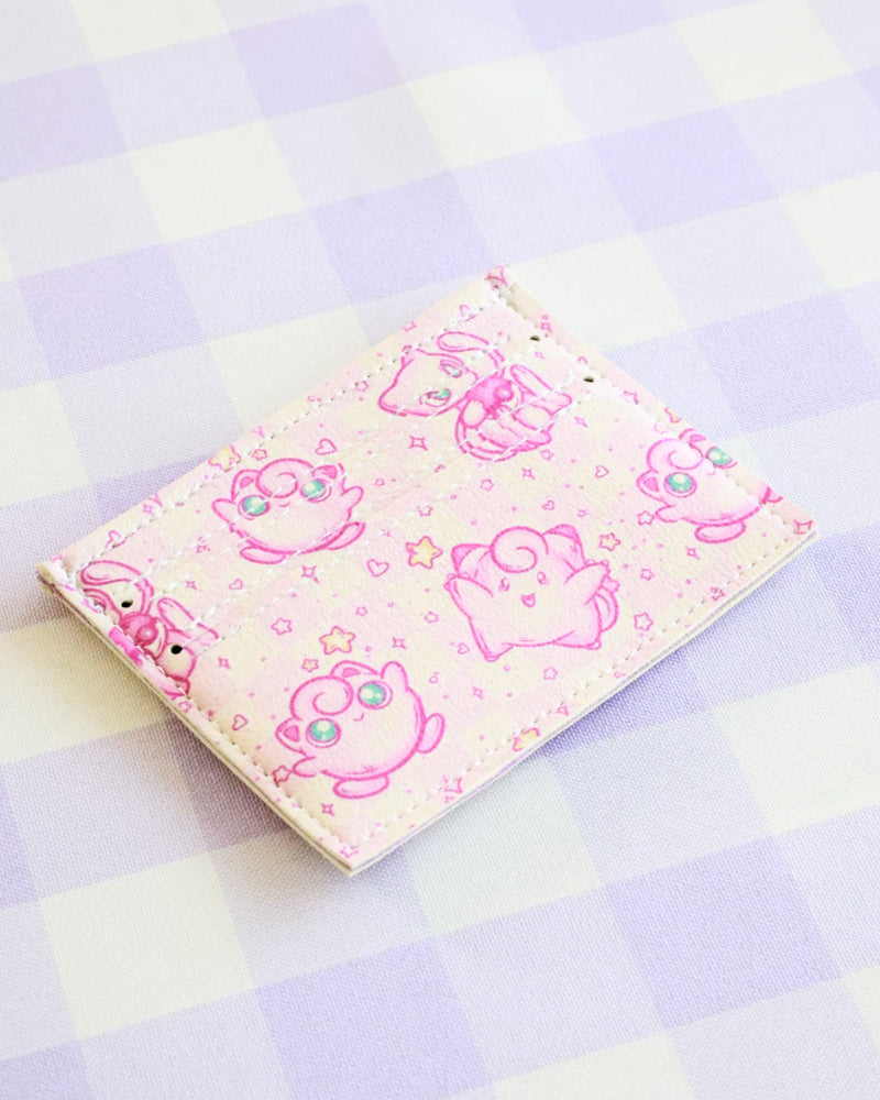 Notebook with cartoon character design on a checkered background