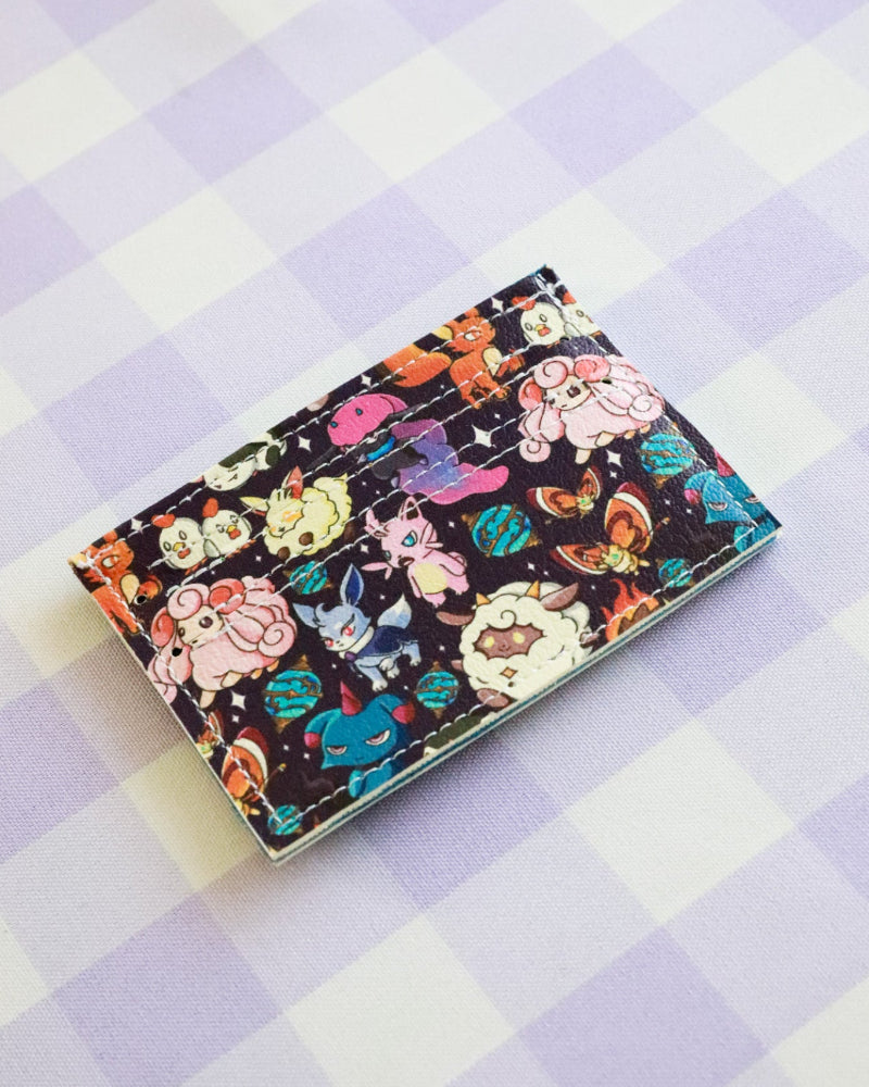 Colorful cartoon character notebook on a checkered background