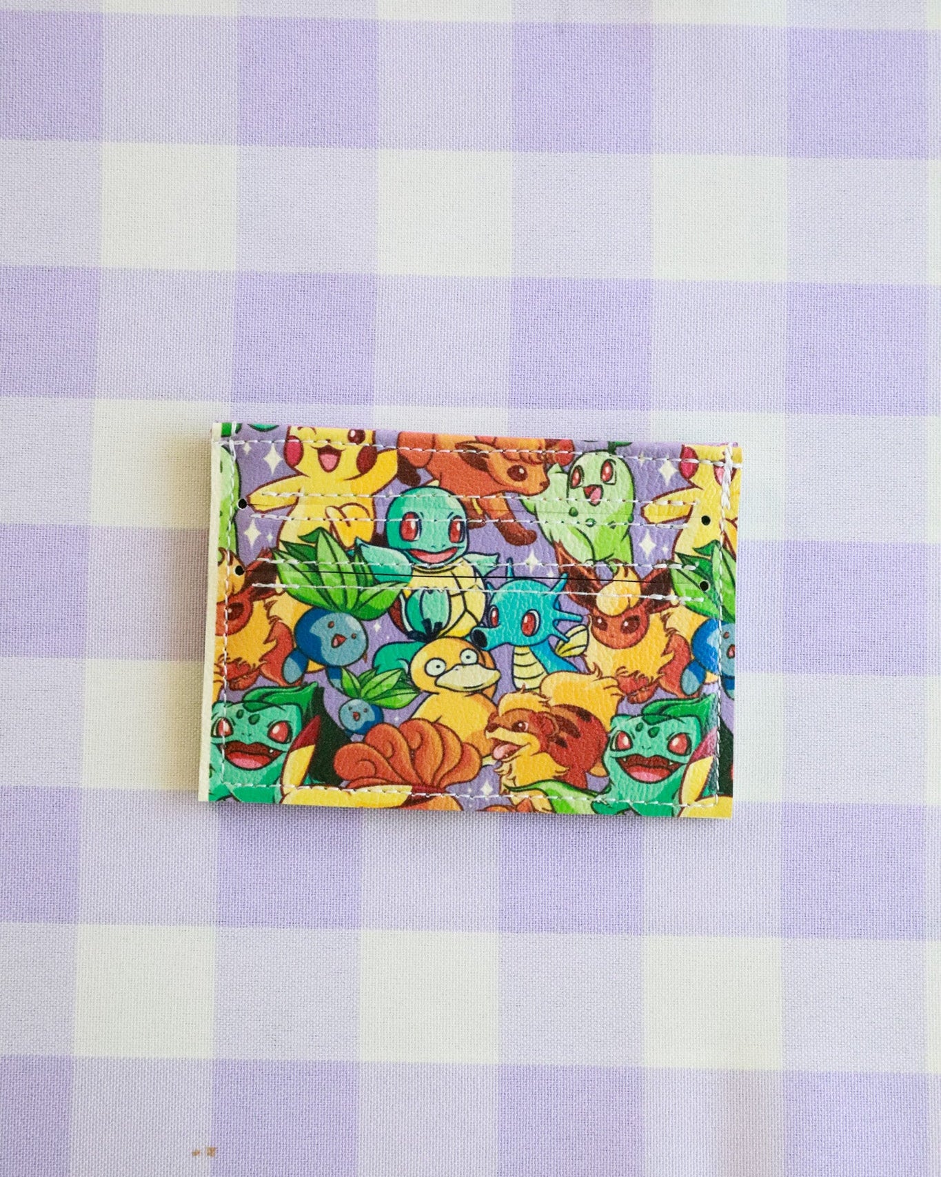 Colorful children's book with cartoon characters on a purple and white checkered background