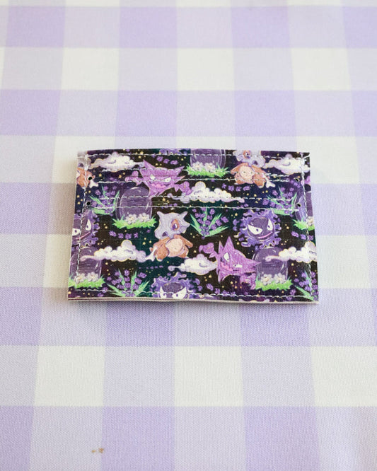 Card with fox design on a purple and white checkered background