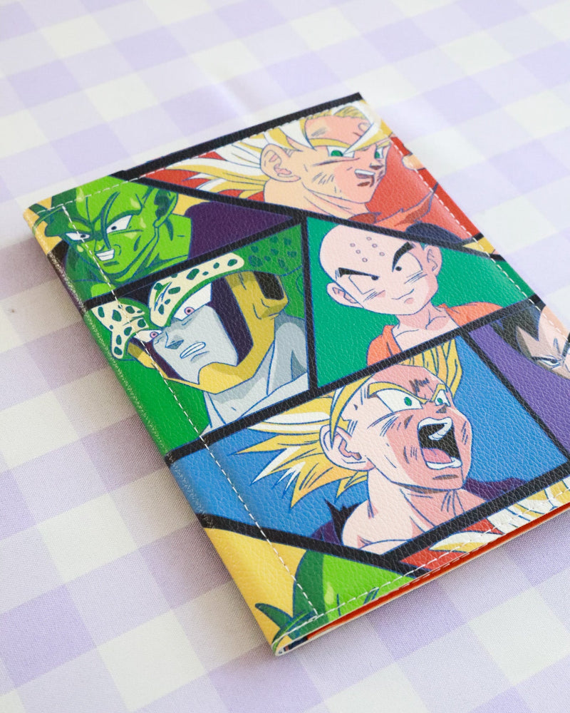 Colorful notebook with character illustrations on a checkered background