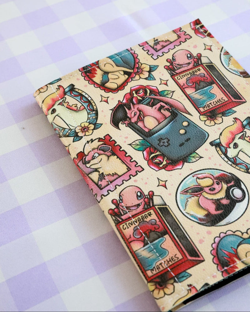 Notebook with vintage-style illustrations on a checkered background