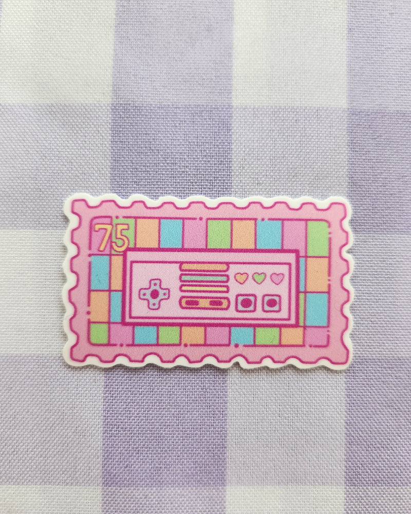 Colorful retro-style sticker on a checkered fabric background