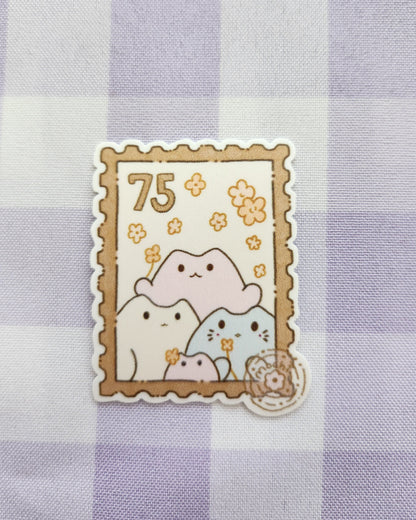 Decorative sticker with cartoon bear design on a purple checkered background