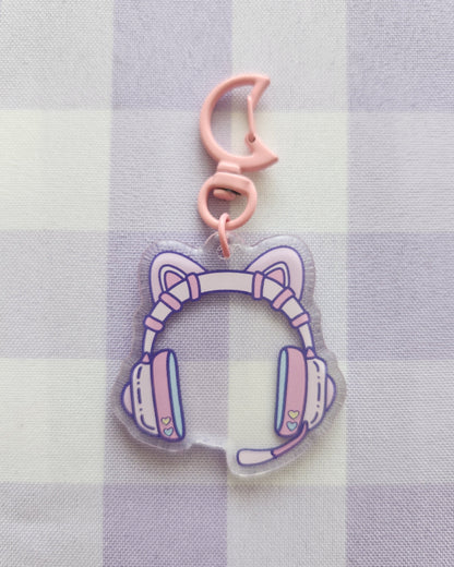 Keychain with cat ear design on a checkered fabric background