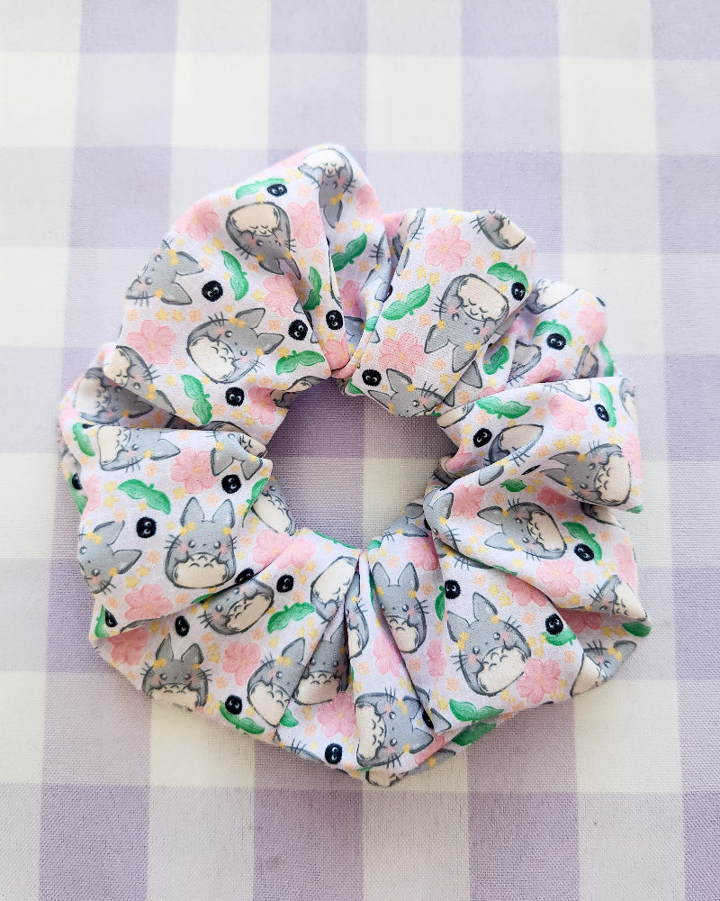 Scrunchie with cat pattern on a checkered background