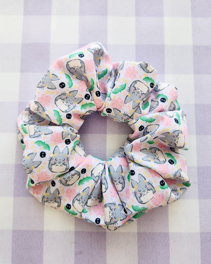 Scrunchie with cat pattern on a checkered background
